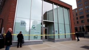 Closed Hartford office with police tape and empty streets.