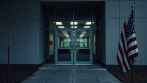 Closed nonprofit office building with US flag