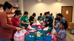 Volunteers packing food for families at community center